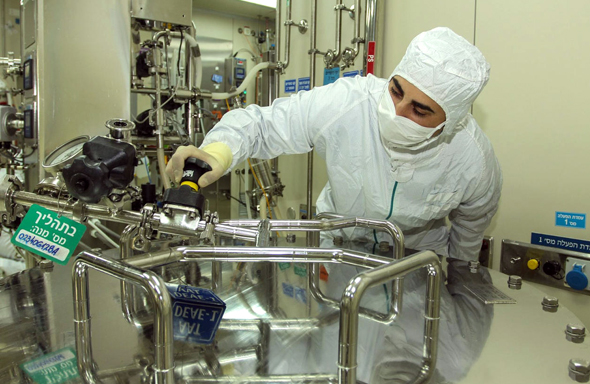 A worker at a Kamada lab. Photo: Kamada