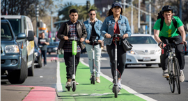 People riding electric scooters in San Francisco. Photo: Bloomberg