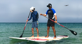 Paddle boarders with AR headsets. Photo: XTend
