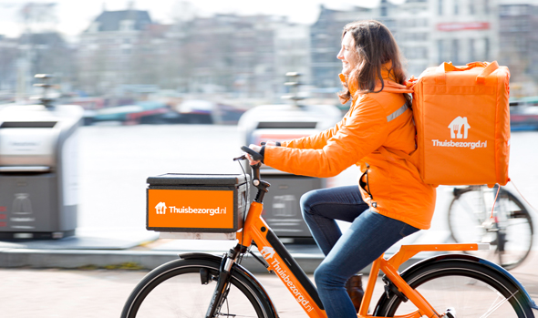 A Takeaway.com delivery woman in the Netherlands. Photo: PR