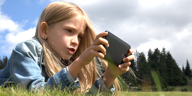 A child playing a video game. Photo: shutterstock