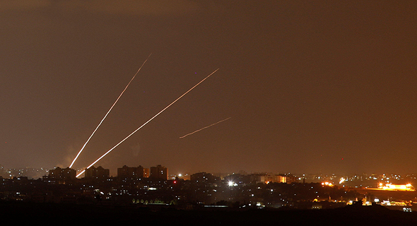 שיגור טילים טילי קאסם מעזה לשטח ישראל, צילום: רויטרס