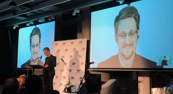 Edward Snowden speaking at an event in Tel Aviv. Photo: Omer Kabir