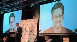 Edward Snowden speaking via video at an event in Tel Aviv. Photo: Omer Kabir