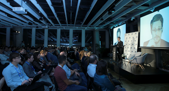 Edward Snowden speaking via video at an event in Tel Aviv. Photo: Orel Cohen