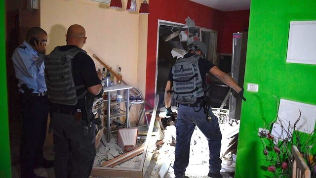 ירי רקטות עזה חמאס בית ב אשקלון, צילום: דוברות המשטרה