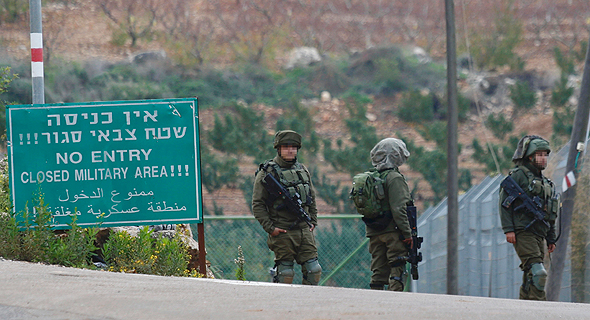 Israeli troops on the Lebanon-Israel border. Photo: AP
