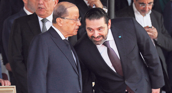 ראש ממשלת לבנון סעד אלחרירי (מימין) והנשיא מישל עאון. חיזבאללה ירצה לקבל גם תיקים חברתיים בממשלה החדשה