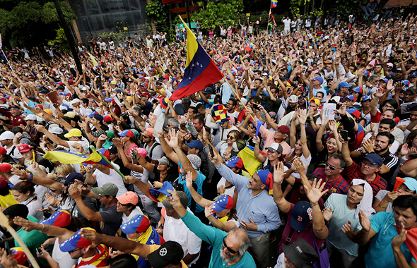 מפגינים נגד הממשל בוונצואלה, צילום: איי פי