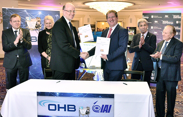 OHB and IAI representatives. Photo: Alex Polo
