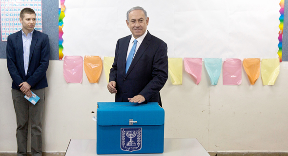 Netanyahu voting in the 2015 elections. Photo: Reuters