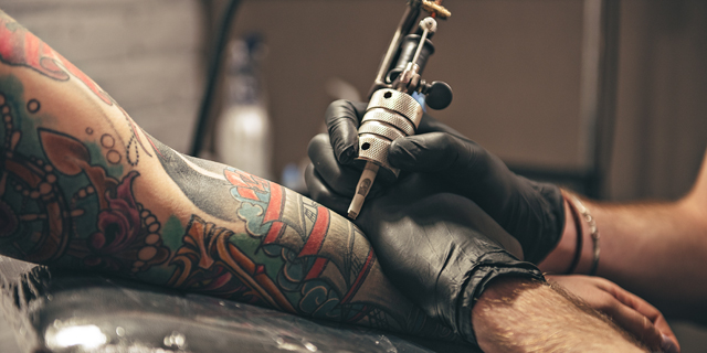 intricate biomechanical tattoo sketch on arm on Craiyon