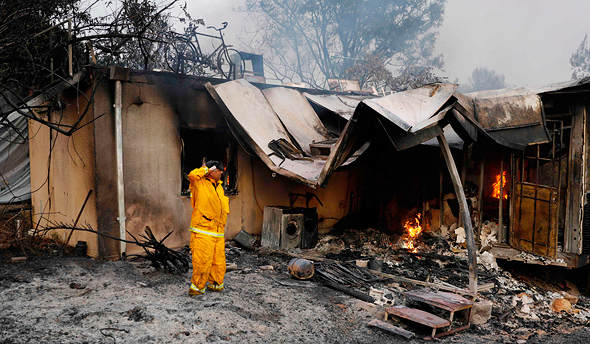  בית שרוף בקיבוץ הראל, צילום: איי אף פי