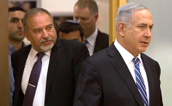 Avigdor Lieberman (left) and Benjamin Netanyahu. Photo: AFP
