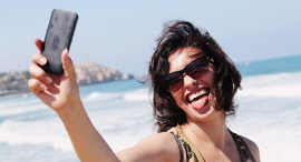 Taking a selfie at one of Tel Aviv's beaches. Photo: Shutterstock