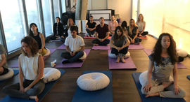 Natural Intelligence  employees practicing mindfulness. Photo: Ofer Shani