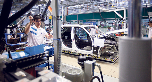 מפעל ב.מ.וו־בריליאנס בסין. אחזקה של 75% לחברה הגרמנית, צילום: Nelson Ching 
