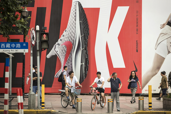 פרסומת ל נייקי ב שנגחאי, צילום: בלומברג