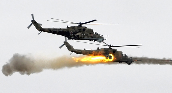 ירי רקטות ממסוק MI24, צילום: Wikimedia