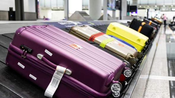 מזוודה מזוודות נמל תעופה טיסה סרט נע, צילום: שאטרסטוק