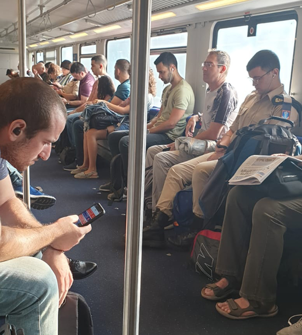 נוסעים ברכבת (ארכיון), צילום: רכבת ישראל