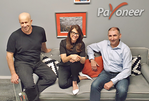 Payoneer's Yoel Naveh (right), Karen Levy, and Yuval Tal. Photo: Payoneer