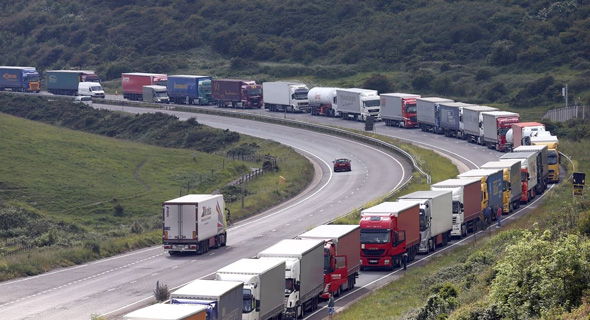 Trucks queue outside Dover port in the UK. Photo: Getty Images