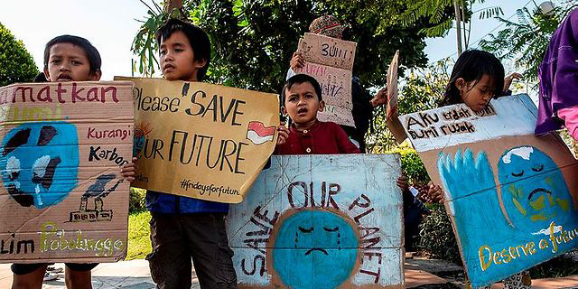 ילדים מפגינים נגד התחממות גלובלית (ארכיון), צילום: איי אף פי