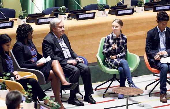 מזכ"ל האו"ם אנטוניו גוטרש ופעילת האקלים גרטה ת'אנברג