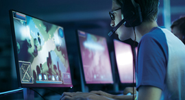 A young man playing a video game. Photo:Shutterstock