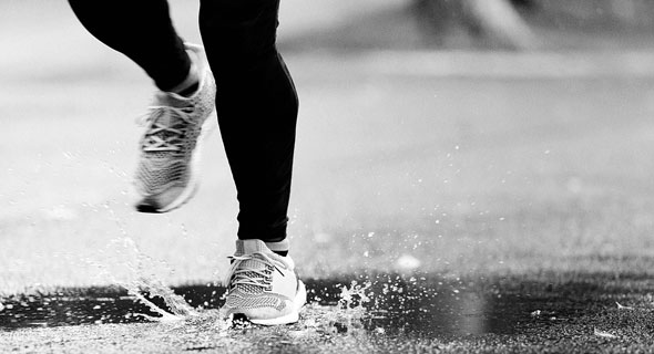 ריצה בגשם, צילום: Shutterstock