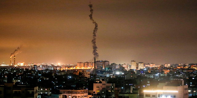  שיגור רקטות מעזה לעבר ישראל, צילום: איי אף פי