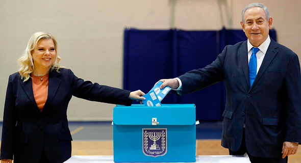 Benjamin and Sara Netanyahu voting. Photo: AFP