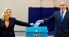 Benjamin and Sara Netanyahu voting. Photo: AFP