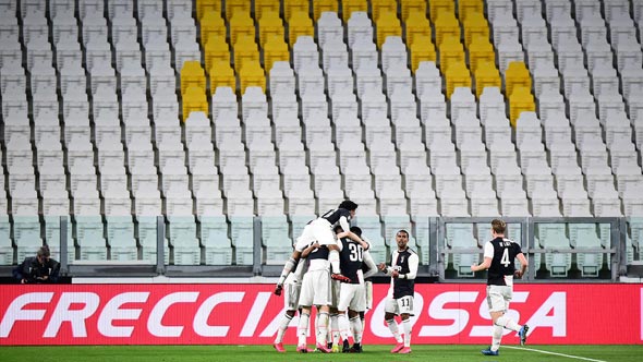 A Champions League game being played in front of an empty stadium. Photo: Reuters