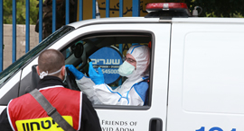 An ambulance taking a corona patient to a hospital in Israel. Photo: Abigail Uzi