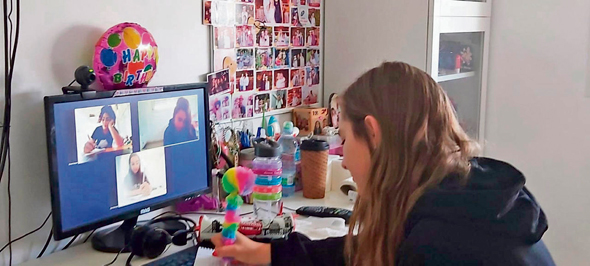 A child in attending a virtual class in Israel.