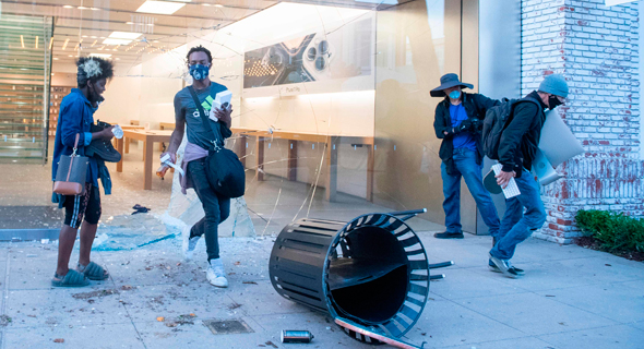 מהומות בארה"ב ביזה אפל לוס אנג'לס, צילום: AFP
