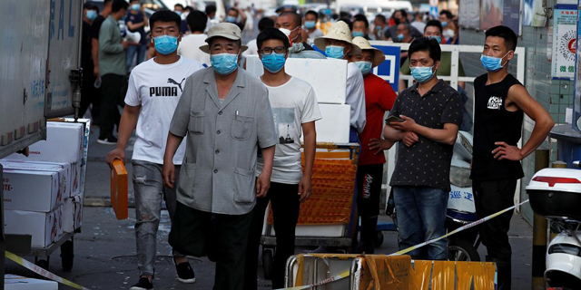 &quot;מצב חירום מלחמתי&quot; בבייג&#39;ינג - עשרות נדבקים בשוק מזון