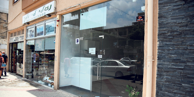 עסקים בכיכר המדינה בת”א שנסגרו במשבר כלכלי , צילום: יאיר שגיא