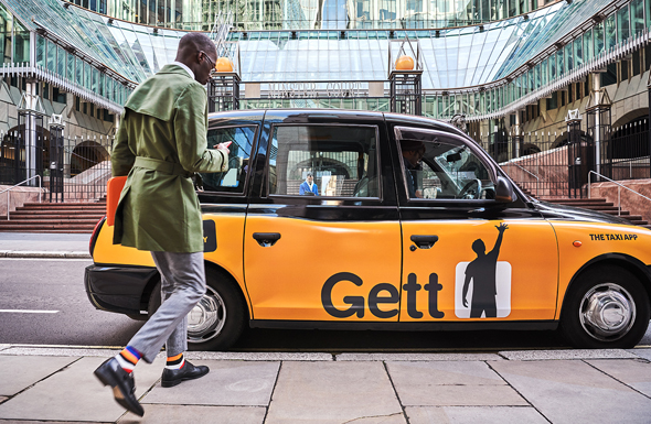 A man enters a Gett vehicle. Photo: Gett