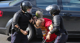 Police arrest a protester in Minsk. Photo: IPA
