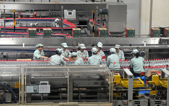 מפעל בסין שעבד בימי הקורונה, צילום: imagine china