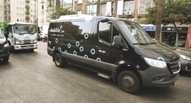 Bubble vans, which run off Via's software. Photo: Shaul Golan