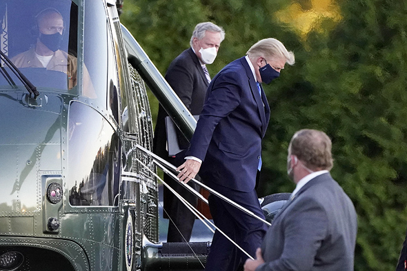 טראמפ בדרכו לאשפוז, צילום: איי פי