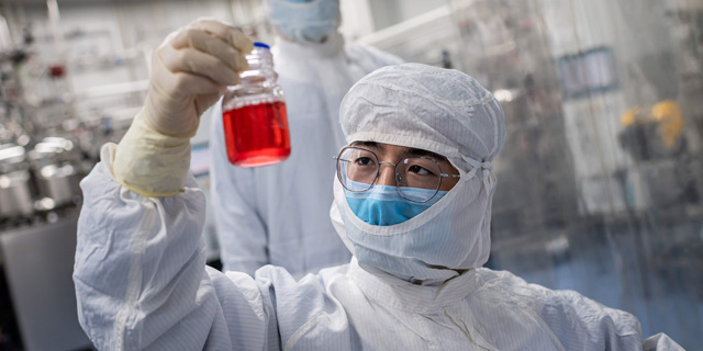 ניסוי בחיסון לקורונה בסין, צילום: איי אף פי