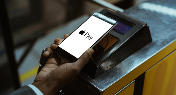 A customer using Apple Pay. Photo: Shutterstock