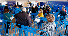Covid-19 vaccine line. Photo: AFP