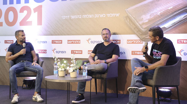 TripActions founders Ilan Twig (left) and Ariel Cohen speaking with Meir Orbach at Calcalist’s FinTech 2021 conference Photo: Yariv Katz 