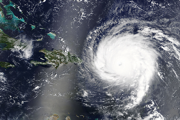 Hurricane Irma severely damaged orange groves, driving up the cost of orange juice. Photo: NASA via Shutterstock